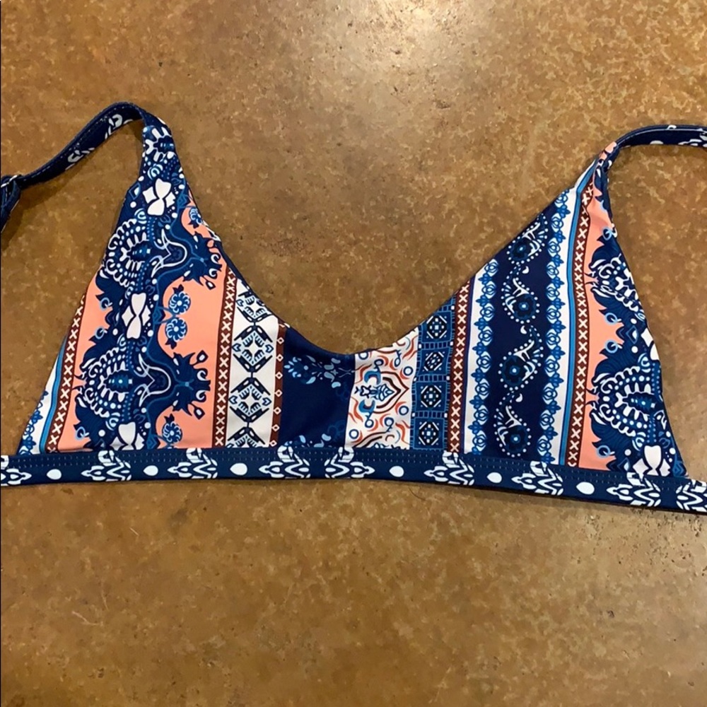 Reversible swim top